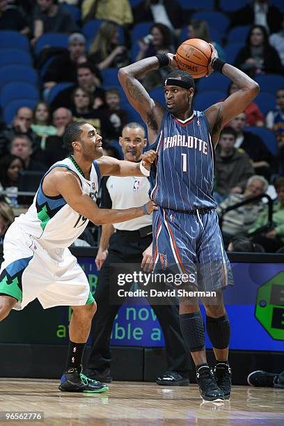 Stephen Jackson of the Charlotte Bobcats looks to pass the ball against Wayne Ellington of the Minnesota Timberwolves during the game on February 10,...