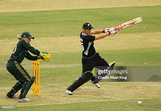 Katey Martin of New Zealand plays a cut shot as Alyssa Healy of Australia keeps wicket during the Second Women's One Day International match between...