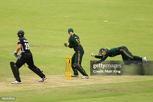 Alex Blackwell of Australia takes a diving slips catch to dismiss Sara McGlashan of New Zealand off the bowling of Shelley Nitschke during the Second...