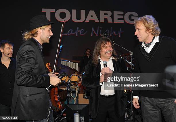 Musician David Garet, Leslie Mandoki and Thomas Gottschalk at the Touareg World Premiere at the Postpalast on February 10, 2010 in Munich, Germany.