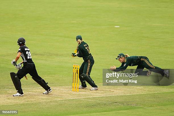 Alex Blackwell of Australia takes a diving slips catch to dismiss Sara McGlashan of New Zealand off the bowling of Shelley Nitschke during the Second...