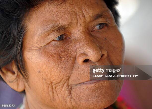 Cambodian woman queues to attend the public hearing of Former Khmer Rouge deputy prime minister and minister of foreign affairs Ieng Sary at the...