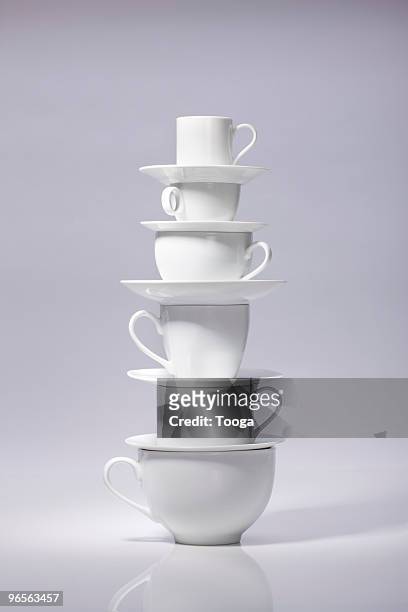 stack of various coffee cups - saucer fotografías e imágenes de stock