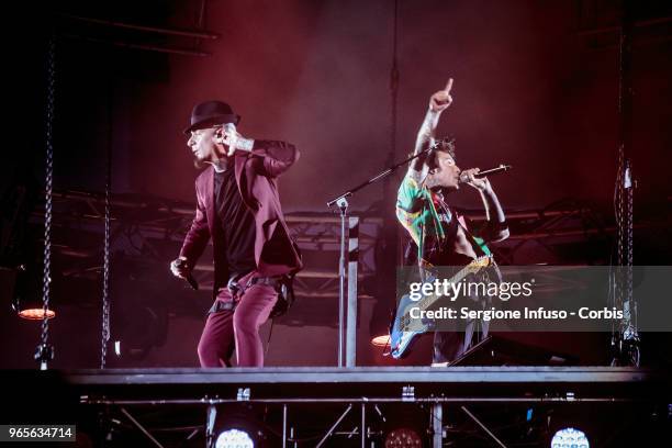 Ax and Fedez perform on stage at Stadio San Siro on June 1, 2018 in Milan, Italy.