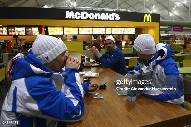Italian athletes sit in the dining hall at the Whistler Olympic village during the media tour ahead of the Vancouver 2010 Winter Olympics on February...