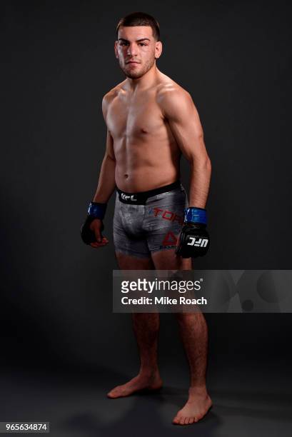 Jose Torres poses for a post fight portrait backstage during the UFC Fight Night event at the Adirondack Bank Center on June 1, 2018 in Utica, New...