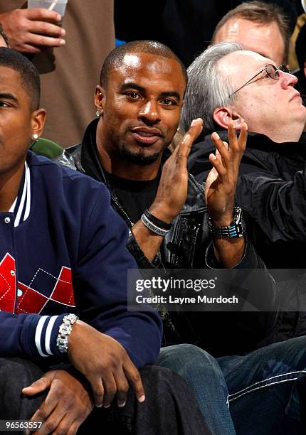 Darren Sharper of the New Orleans Saints watches an NBA game between the Boston Celtics and New Orleans Hornets on February 10, 2010 at the New...