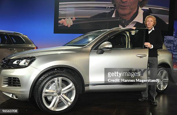Thomas Gottschalk shows the new Touareg during the Touareg World Premiere at the Postpalast on February 10, 2010 in Munich, Germany.