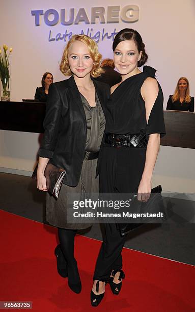 Actress Anna - Maria Muehe and Hannah Herzsprung attend the Touareg World Premiere at the Postpalast on February 10, 2010 in Munich, Germany.