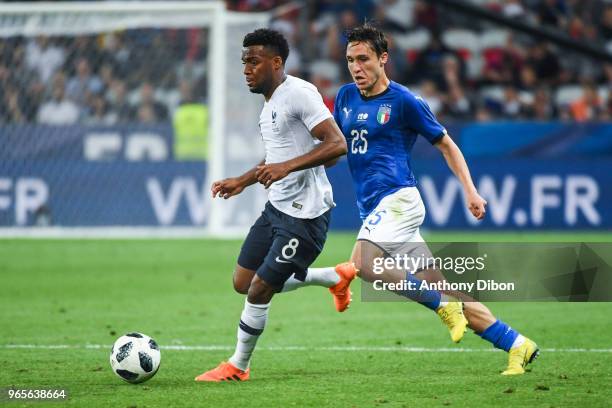 Thomas Lemar of France and Federico Chiesa of Italy during the International Friendly match between France and Italy at Allianz Riviera Stadium on...