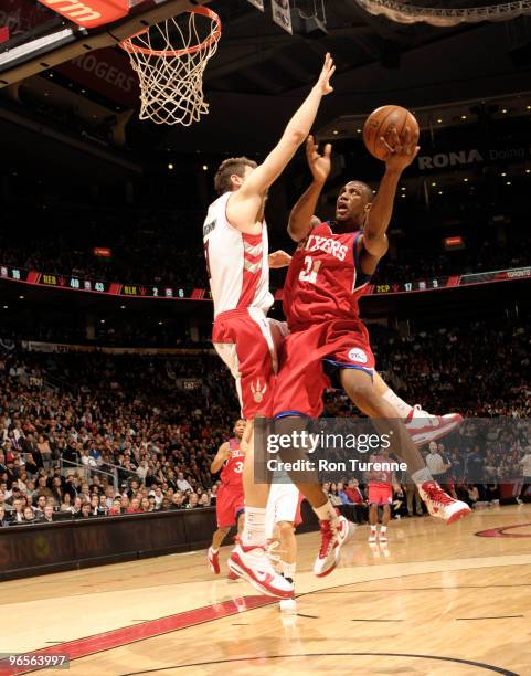 Thaddeus Young of the Philadelphia 76ers puts up the shot against Andrea Bargnani of the Toronto Raptors during a game on February 10, 2010 at the...