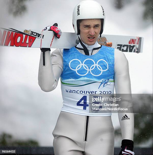 Martin Schmitt of Germany looks on during a Ski Jumping training session ahead of the Vancouver 2010 Winter Olympics at the Ski Jumping Stadium on...