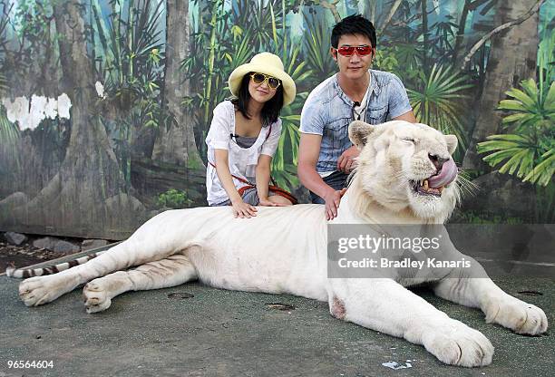 Chinese film stars Lu Yi and Bao Lei meet Bengal tiger Mohan as they welcome in the Chinese New Year of the Tiger at Dreamworld theme park on...