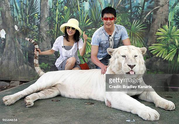 Chinese film stars Lu Yi and Bao Lei meet Bengal tiger Mohan as they welcome in the Chinese New Year of the Tiger at Dreamworld theme park on...