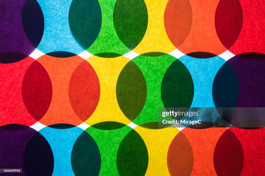 Rainbow Colored Circle Paper Back-lit Pattern