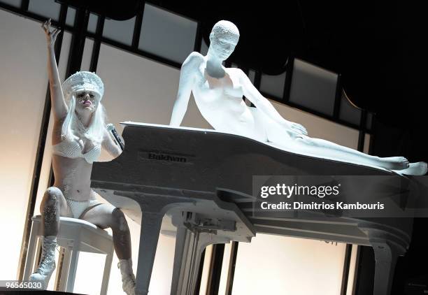 Singer Lady Gaga performs onstage at the amfAR New York Gala To Kick Off Fall 2010 Fashion Week at Cipriani 42nd Street on February 10, 2010 in New...