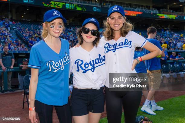 Eliza Coupe, Laura Marano and Hilarie Burton pose for a photo during the celebrity softball game at Kauffman Stadium during the Big Slick Celebrity...