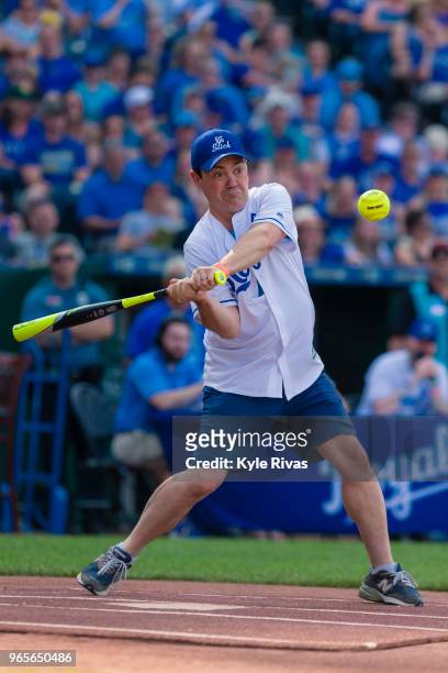 Joe Lo Truglio swings at a pitch while taking part in the celebrity softball game at Kauffman Stadium during the Big Slick Celebrity Weekend...