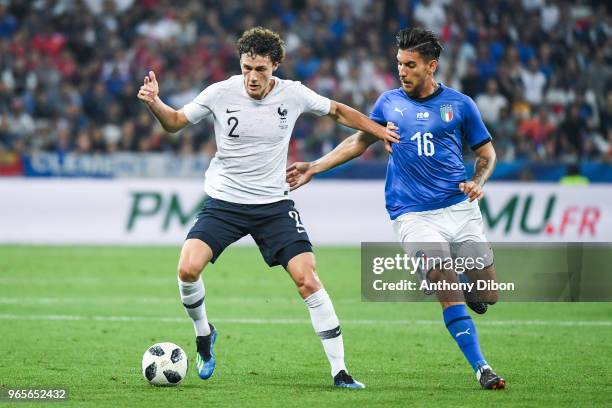 Benjamin Pavard of France and Lorenzo Pellegrini of Italy during the International Friendly match between France and Italy at Allianz Riviera Stadium...