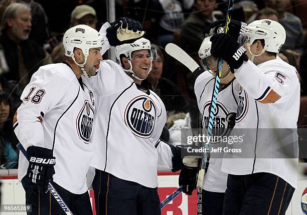 Ethan Moreau, Ryan Potulny, Denis Grebeshkov and Ladislav Smid of the Edmonton Oilers celebrate Potulny's second period goal against the Anaheim...