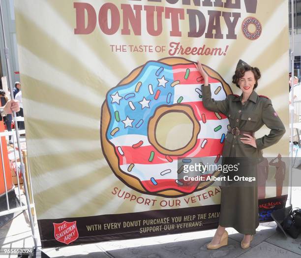 Actress Amber Martinez participates in The Salvation Army And Bakemark's 2nd Annual National Donut Day World Donut Eating Championship To Benefit...