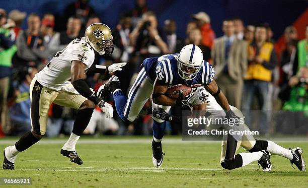 Pierre Garcon of the Indianapolis Colts gets a first down against New Orleans Saints during Super Bowl XLIV on February 7, 2010 at Sun Life Stadium...