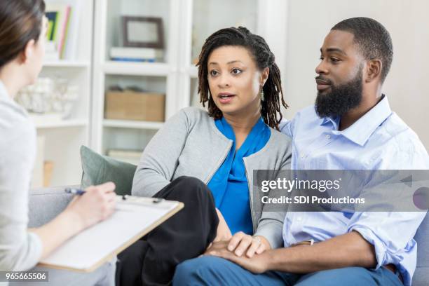 couple seek marriage counseling - married doctor stock pictures, royalty-free photos & images