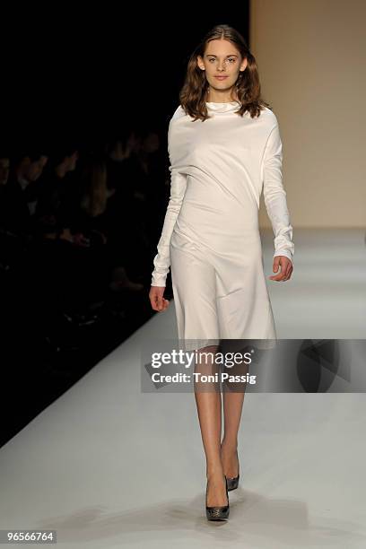 Model walks the runway at the Michael Sontag Fashion Show during the Mercedes-Benz Fashion Week Berlin Autumn/Winter 2010 at the Bebelplatz on...