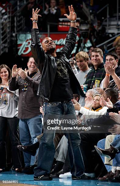 Darren Sharper of the New Orleans Saints watches an NBA game between the Boston Celtics and New Orleans Hornets on February 10, 2010 at the New...