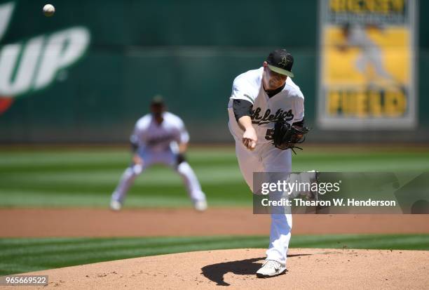 Trevor Cahill of the Oakland Athletics pitches against the Tampa Bay Rays in the top of the first inning at the Oakland Alameda Coliseum on May 28,...