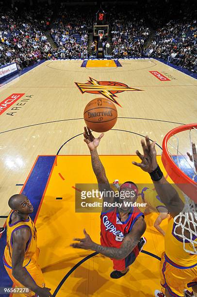 Bobby Brown of the Los Angeles Clippers attempts a layup against the Golden State Warriors on February 10, 2010 at Oracle Arena in Oakland,...