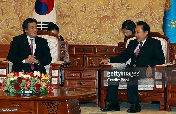 Japanese Foreign Minister Katsuya Okada talks with South Korean President Lee Myung-Bak at the presidential house on February 11, 2010 in Seoul,...