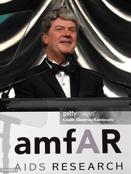 Yves Carcelle speaks onstage at the amfAR New York Gala co-sponsored by M.A.C Cosmetics at Cipriani 42nd Street on February 10, 2010 in New York, New...