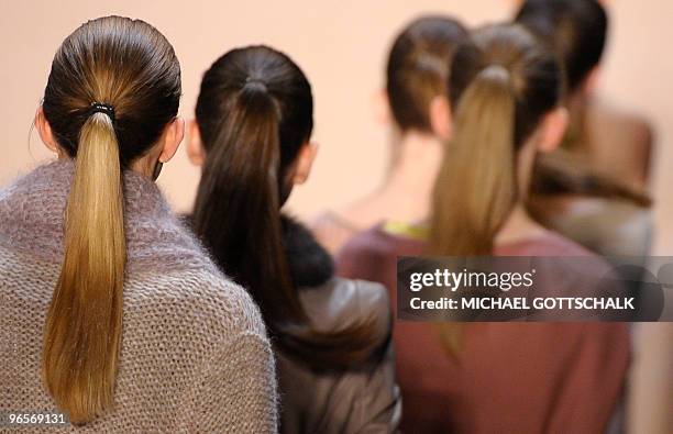 Models present outfits of German label Schumacher during the Berlin Fashion Week in Berlin, Germany 20 January 2010. Some 30 designers present their...