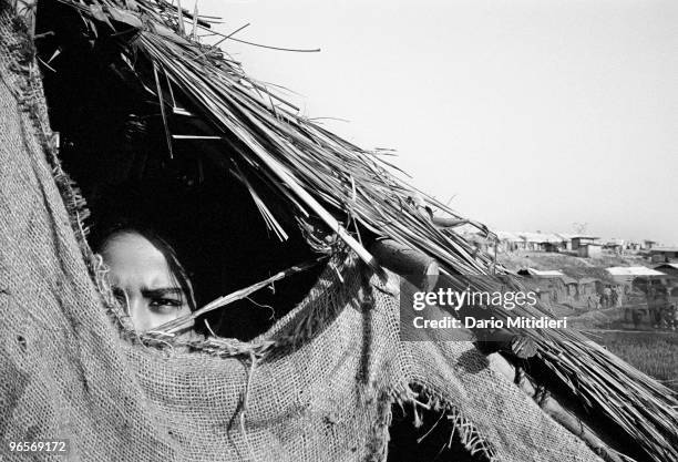 Rohingya refugees, a Muslim minority from Myanmar's Northern Rakhine state, wait to be returned home by the UNHCR, the UN Refugees Agency, from...