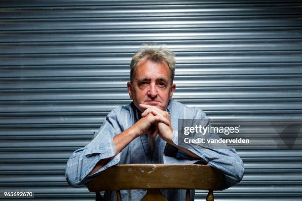 portrait of a man in his 50s - vandervelden stock pictures, royalty-free photos & images