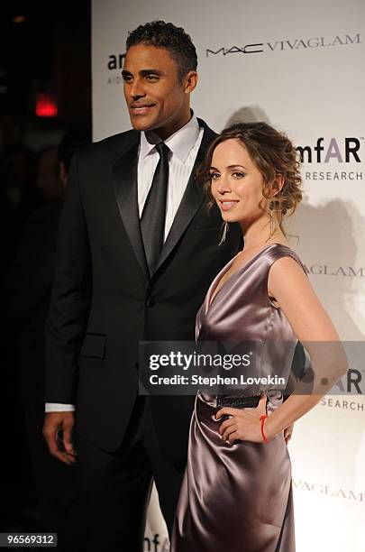 Athlete Rick Fox and actress Eliza Dushku attend the amfAR New York Gala co-sponsored by M.A.C Cosmetics at Cipriani 42nd Street on February 10, 2010...