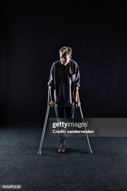 depressed disabled man - vandervelden stock pictures, royalty-free photos & images