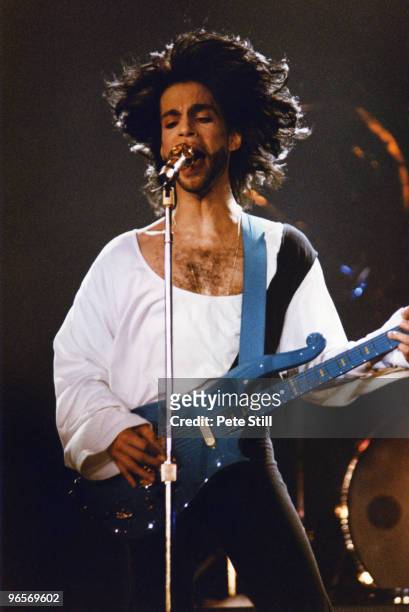 Prince performs on stage at Wembley Arena on his 'Nude' tour on July 11th, 1990 in London, United Kingdom.