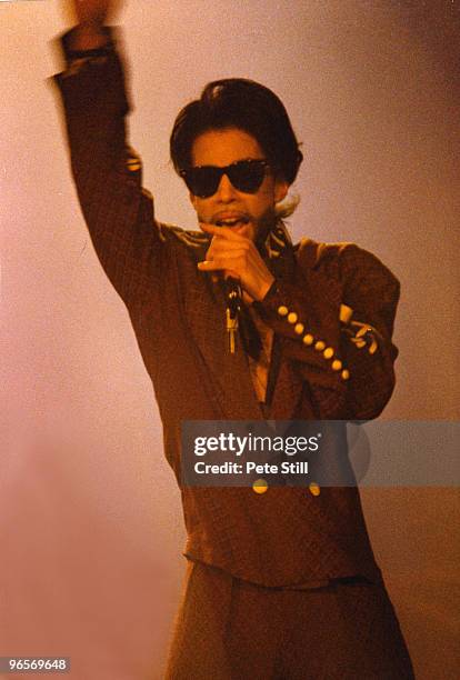 Prince performs on stage at Wembley Arena on his 'Nude' tour on July 11th, 1990 in London, United Kingdom.