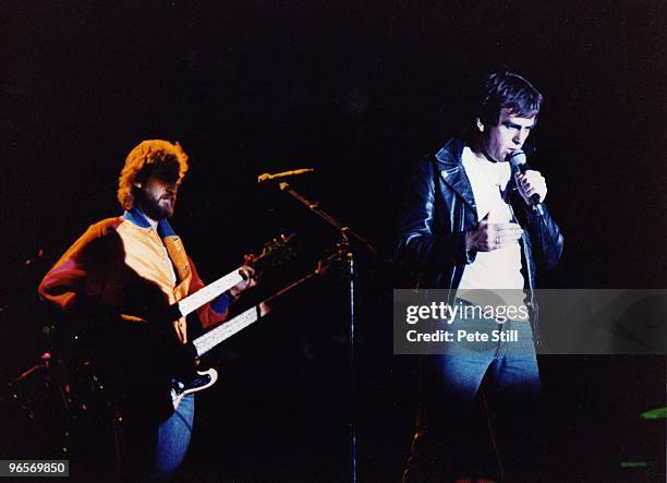 Peter Gabriel and Mike Rutherford on stage performing with Genesis at the reunion concert 'Six of the Best' at The National Bowl on October 2nd, 1982...