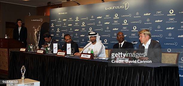 Edwin Moses of the USA The Chairman of the Laureus World Sports Academy with His Excellency Mohammed Ibrahim Al Mahmood The Secretary General of the...