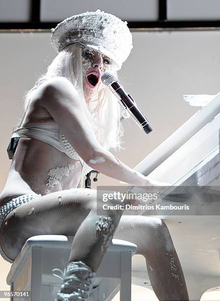 Singer Lady Gaga performs onstage at the amfAR New York Gala To Kick Off Fall 2010 Fashion Week at Cipriani 42nd Street on February 10, 2010 in New...