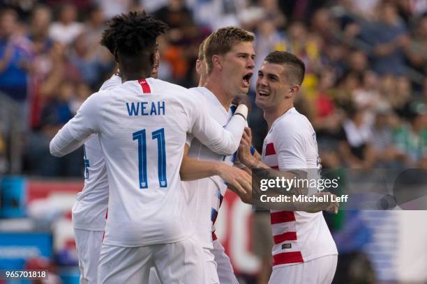 Walker Zimmerman of the United States celebrates scoring his goal with Erik Palmer-Brown, Tim Weah, and Christian Pulisic during the friendly soccer...