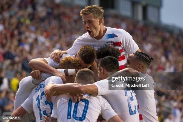 Josh Sargent of the United States celebrates after scoring a goal along with Eric Lichaj, Tim Weah, Joe Corona, Christian Pulisic, Rubio Rubin, Erik...