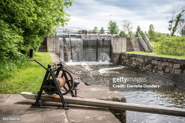 elevated shot of crank to open long island lock station on the rideau canal near manotick - ottawa locks stock pictures, royalty-free photos & images