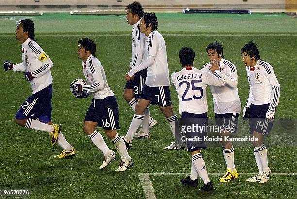 Keiji Tamada of Japan celebrates with his teammates during the East Asian Football Championship 2010 match between Japan and Hong Kong at the...