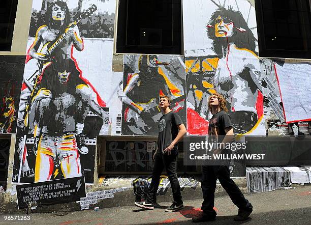 Fans of Australian heavy rock legends AC/DC, Luis Hird and Ron Inglis from Hobart in the southern Australian state of Tasmania, visit AC/DC Lane -...