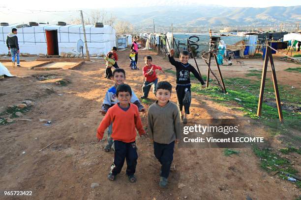 Enfants syriens, originaires de Homs, Raqqa et Hasaka, qui ont fui les opérations militaires de l?armée syrienne et les exactions de l?Etat...