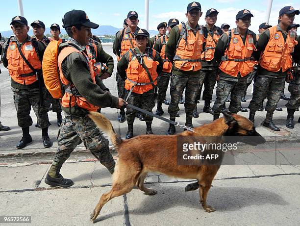 Members of the Humanitarian and Rescue Unit of the Guatemalan Army get ready to depart for Haiti, on January 13, 2010 in Guatemala City. Planeloads...